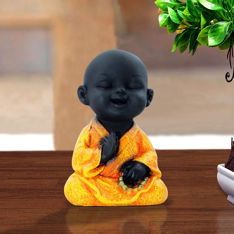 Buddha Idols Handcrafted Ployresin Lord Buddha Sitting And Praying Statue Showpiece Home Decor/Office Decor/Spiritual Gift, Black And Orange Home Decor Showpiece and Gifts by HomeDecorKart and Karigaari India