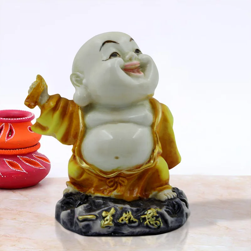 Buddha Idols Handcrafted Ployresin Lord Buddha Standing On Stone And Laughing Statue Showpiece Home Decor/Office Decor/Spiritual Gift, Yellow Home Decor Showpiece and Gifts by HomeDecorKart and Karigaari India