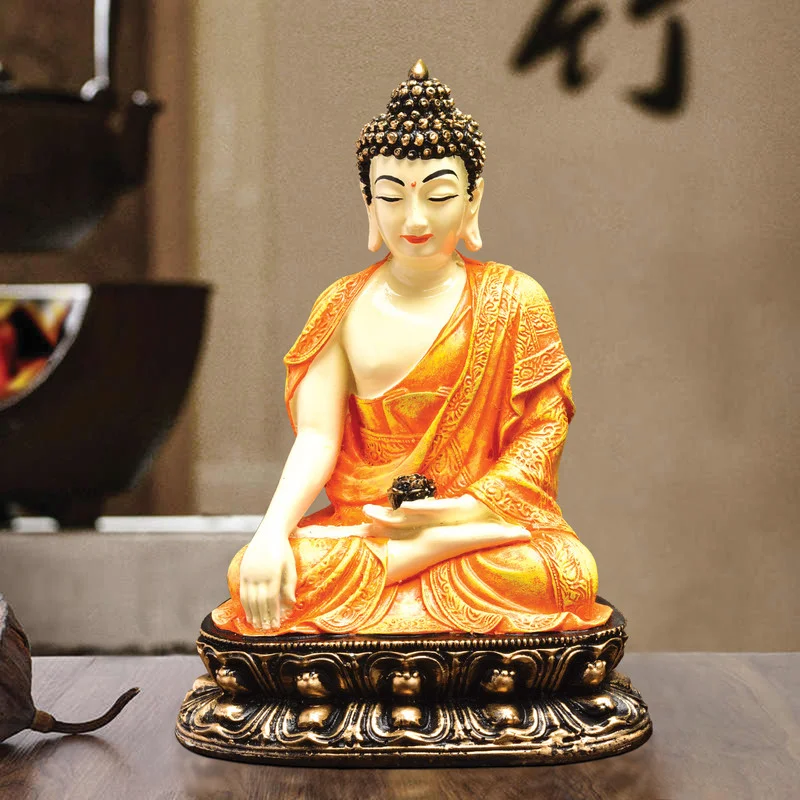 Buddha Idols Handcrafted Ployresin Lord Buddha Orange Colour Sitting Statue Sitting On Golden Colour Table Showpiece Home Decor/Office Decor/Spiritual Gift Home Decor Showpiece and Gifts by HomeDecorKart and Karigaari India