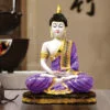 Handcrafted Ployresin Lord Buddha Meditating Statue Sitting On Golden Colour Table Showpiece Home Decor/Office Decor/Spiritual Gift, Purple Colour