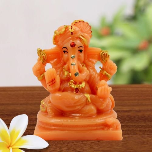 Home Decor Lord Ganesha Sitting with Two Leg Fold Orange Colour Idol for Home Decor Home Decor Showpiece and Gifts by HomeDecorKart and Karigaari India