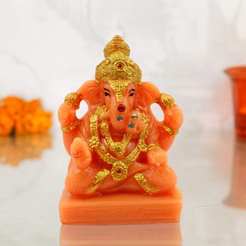 Car Dashboard Idols Lord Ganesha Sitting And Giving Blessing Orange Colour Idol for Home Decor Home Decor Showpiece and Gifts by HomeDecorKart and Karigaari India