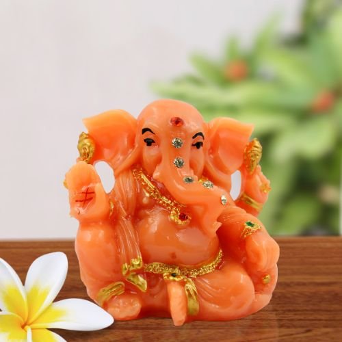 Car Dashboard Idols Lord Ganesha Sitting Without Mughat Orange Colour Idol for Home Decor Home Decor Showpiece and Gifts by HomeDecorKart and Karigaari India