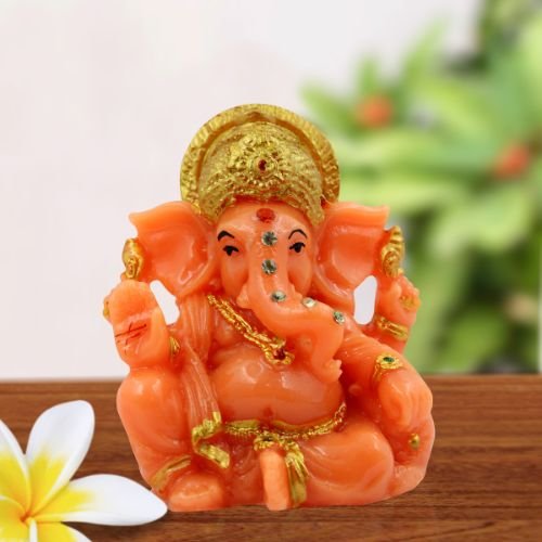 Home Decor Lord Ganesha sitting Wearing Golden Crown Orange Colour Idol for Home Decor Home Decor Showpiece and Gifts by HomeDecorKart and Karigaari India