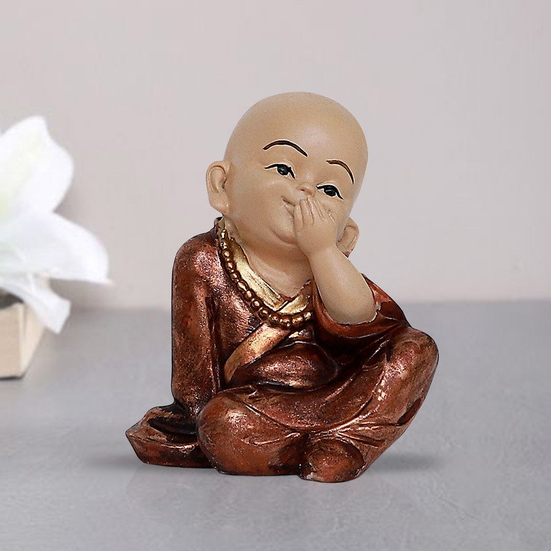 Buddha Idols Handcrafted Ployresin Lord Buddha Sitting With Putting Hand On Mouth Statue Showpiece Home Decor/Office Decor/Spiritual Gift, Shiny Brown Home Decor Showpiece and Gifts by HomeDecorKart and Karigaari India