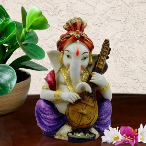 Ganesha Idols Lord Ganesha Playing Guitar Idol for Home Decor Home Decor Showpiece and Gifts by HomeDecorKart and Karigaari India