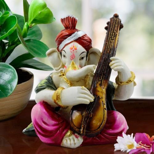 Ganesha Idols Lord Ganesha Playing Guitar Wearing Pink Dhoti Idol for Home Decor Home Decor Showpiece and Gifts by HomeDecorKart and Karigaari India