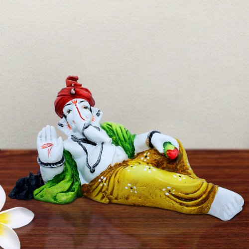 Ganesha Idols Lord Ganesha Sleeping Wearing Yellow Dhoti Idol for Home Decor Home Decor Showpiece and Gifts by HomeDecorKart and Karigaari India