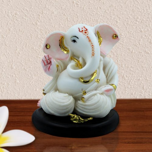 Car Dashboard Idols Lord Ganesha Sitting with Folding Legs White Color Idol for Home Decor Home Decor Showpiece and Gifts by HomeDecorKart and Karigaari India