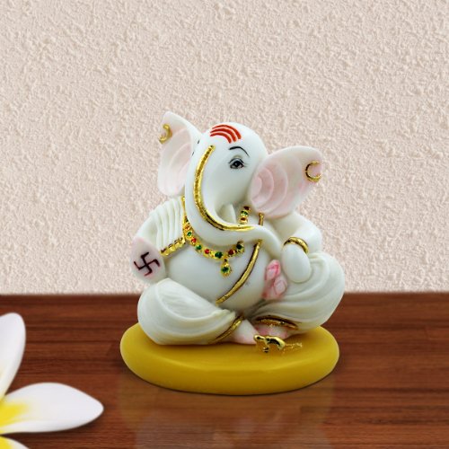 Car Dashboard Idols Small Lord Ganesha Sitting With Swastik on Hand White Color Idol for Home Decor Home Decor Showpiece and Gifts by HomeDecorKart and Karigaari India