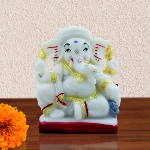 Car Dashboard Idols Lord Ganesha Sitting Idol With One Leg Up White Color Best for Home Decor Home Decor Showpiece and Gifts by HomeDecorKart and Karigaari India