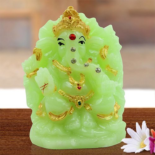 Car Dashboard Idols Unique Design Lord Ganesha Sitting Idol Green Color With Golden Ornaments Best for Home Decor Home Decor Showpiece and Gifts by HomeDecorKart and Karigaari India