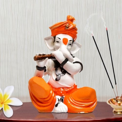 Ganesha Idols Unique Little Lord Ganesha Playing Flute Idol Orange Best for Home Decor Home Decor Showpiece and Gifts by HomeDecorKart and Karigaari India