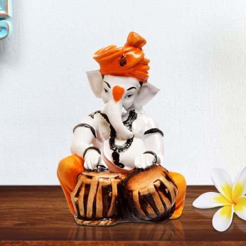 Ganesha Idols Unique Little Lord Ganesha Playing Tabla Idol Orange Best for Home Decor Home Decor Showpiece and Gifts by HomeDecorKart and Karigaari India