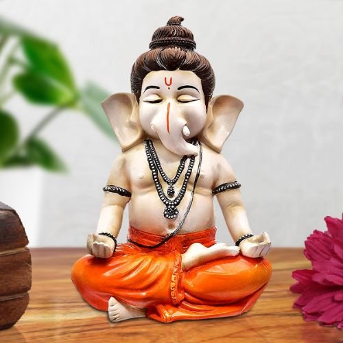 Ganesha Idols Unique Little Lord Ganesha Sitting In Yoga Position Idol Orange Best for Home Decor Home Decor Showpiece and Gifts by HomeDecorKart and Karigaari India