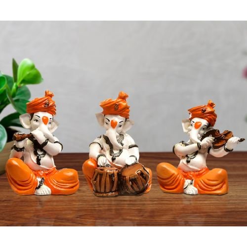 Ganesha Idols Unique Three Lord Ganesha Playing Instruments Idol Orange Best for Home Decor Home Decor Showpiece and Gifts by HomeDecorKart and Karigaari India