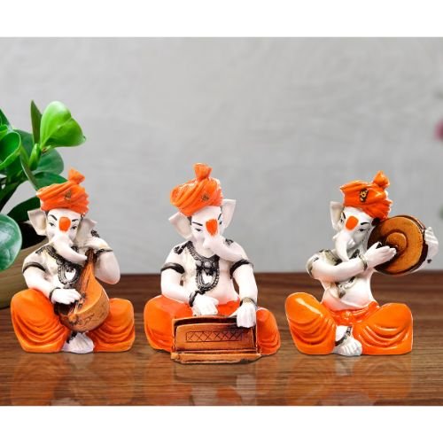 Ganesha Idols Unique Design Three Lord Ganesha Playing Instruments Idol Orange Best Item for Home Decor Home Decor Showpiece and Gifts by HomeDecorKart and Karigaari India