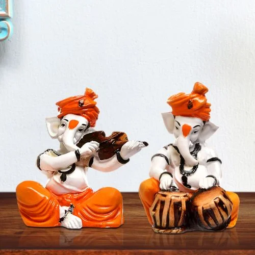 Ganesha Idols Unique Design Two Little Lord Ganesha Playing Instruments Idol Orange Best Item for Home Decor Home Decor Showpiece and Gifts by HomeDecorKart and Karigaari India