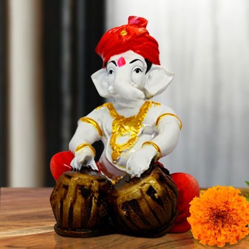 Home Decor Small Lord Ganesha Idol Playing Tabla Best & Unique Design Pink Color for Home Decor Home Decor Showpiece and Gifts by HomeDecorKart and Karigaari India