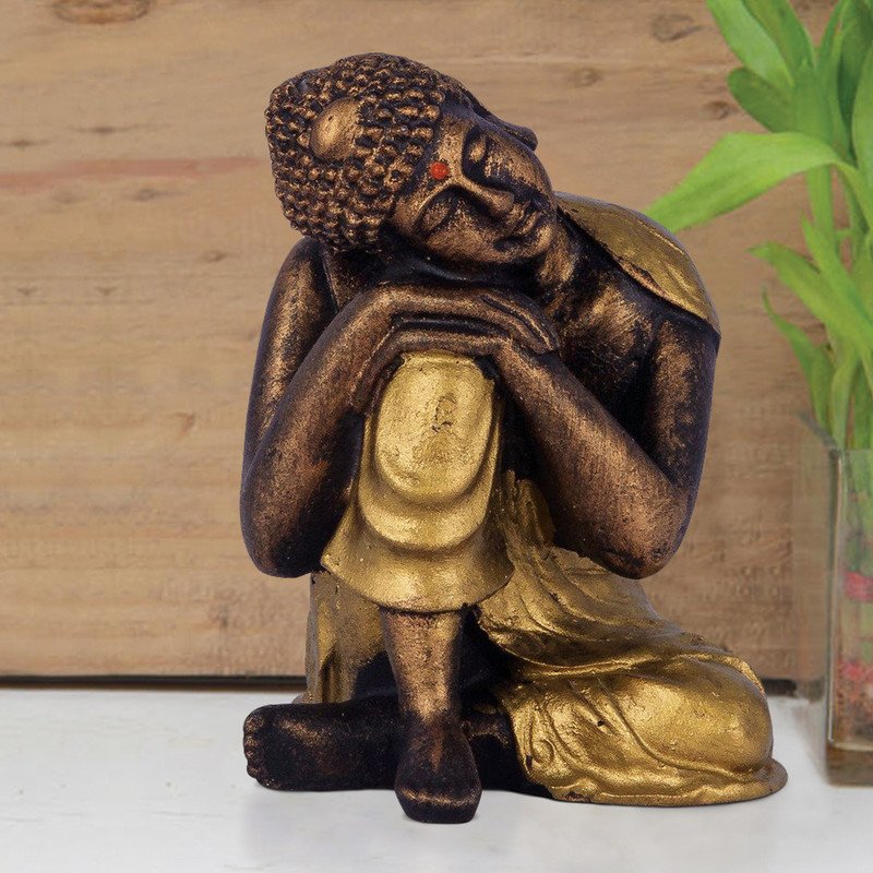 Buddha Idols Handcrafted Ployresin Sitting With Putting Hand And Head on Knee Lord Buddha Statue Showpiece Home Decor/Office Decor/Spiritual Gift, Golden Colour Home Decor Showpiece and Gifts by HomeDecorKart and Karigaari India