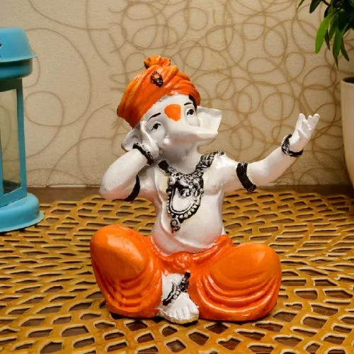 Ganesha Idols Unique Little Lord Ganesha Singing Idol Orange Best for Home Decor Home Decor Showpiece and Gifts by HomeDecorKart and Karigaari India
