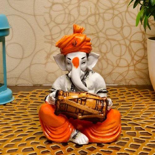 Ganesha Idols Unique Little Lord Ganesha Playing Dhol Idol Orange Best for Home Decor Home Decor Showpiece and Gifts by HomeDecorKart and Karigaari India