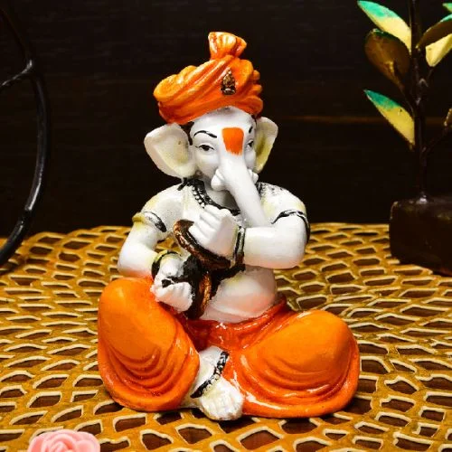 Ganesha Idols Unique Little Lord Ganesha Playing Manjira Idol Orange Best for Home Decor Home Decor Showpiece and Gifts by HomeDecorKart and Karigaari India