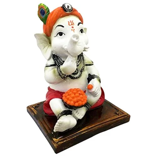 Ganesha Idols Little Lord Ganesha Sitting & Eating Laddu Idol Best for Home Decor Home Decor Showpiece and Gifts by HomeDecorKart and Karigaari India