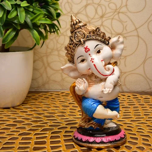 Ganesha Idols Unique Little Lord Ganesha Sitting Wearing Blue Dhoti Best Item for Home Decor Multicolor Home Decor Showpiece and Gifts by HomeDecorKart and Karigaari India
