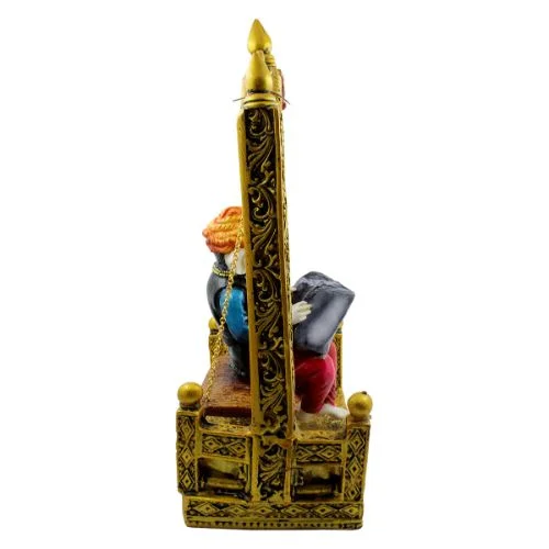 Ganesha Idols Lord Ganesha Sitting on Jhula Reading newspaper Idol for Home Decor Home Decor Showpiece and Gifts by HomeDecorKart and Karigaari India