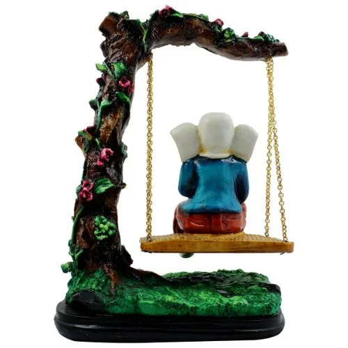 Ganesha Idols Lord Ganesha Sitting on Jhula Playing Flute Idol for Home Decor Home Decor Showpiece and Gifts by HomeDecorKart and Karigaari India