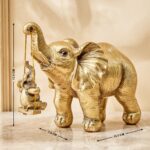 Gold Finish Elephant with Hanging Baby Decorative Resin Animal Idol-Gold Home Accent Showpiece - Karigaari India Aesthetic Home Decor
