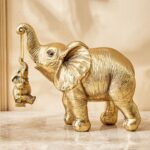 Gold Finish Elephant with Hanging Baby Decorative Resin Animal Idol-Gold Home Accent Showpiece - Karigaari India Aesthetic Home Decor