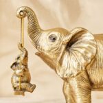 Gold Finish Elephant with Hanging Baby Decorative Resin Animal Idol-Gold Home Accent Showpiece - Karigaari India Aesthetic Home Decor