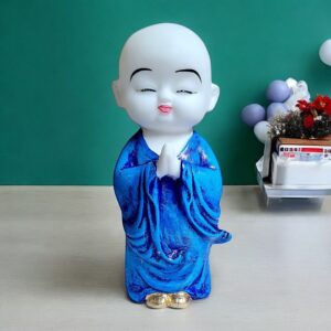 Blissful Baby Buddha Idol in Blue Resin Namaste Monk Statue for Calm Vibes, Home Decor & Spiritual Gifting - Karigaari India Aesthetic Home Decor