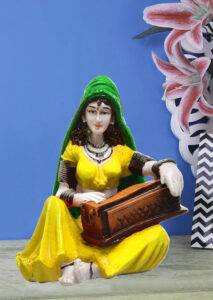Enchanting Melody Figurine: Hand-Painted Resin Rajasthani Woman with Instrument - Karigaari India Aesthetic Home Decor