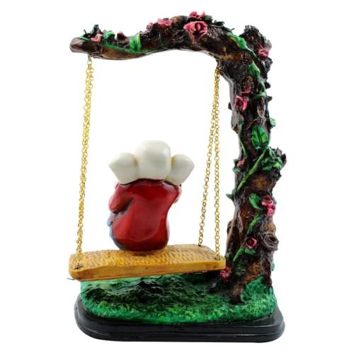 Lord Ganesha Sitting on Jhula Under Tree Multicolor Idol for Home Decor - Karigaari India Aesthetic Home Decor