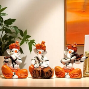 Unique Little Three Lord Ganesha Playing Instruments Idol Orange Best for Home Decor - Karigaari India Aesthetic Home Decor