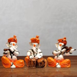 Unique Little Three Lord Ganesha Playing Instruments Idol Orange Best for Home Decor - Karigaari India Aesthetic Home Decor