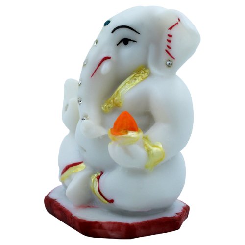 Small Lord Ganesha Sitting With Holding Red Modak in Hand White Color Idol for Home Decor - Karigaari India Aesthetic Home Decor