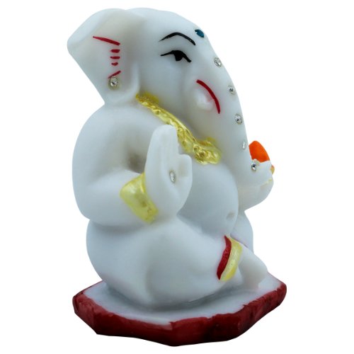 Small Lord Ganesha Sitting With Holding Red Modak in Hand White Color Idol for Home Decor - Karigaari India Aesthetic Home Decor