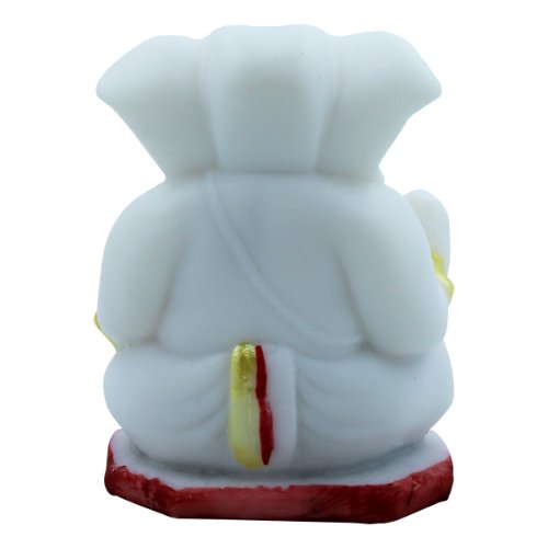 Small Lord Ganesha Sitting With Holding Red Modak in Hand White Color Idol for Home Decor - Karigaari India Aesthetic Home Decor