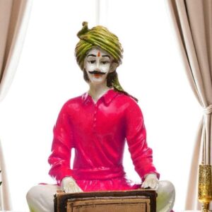 Ancient Notes in Resin: Exquisite Sculpture of a Rajasthani Harmonium Player - Karigaari India Aesthetic Home Decor