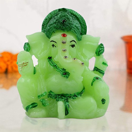 Unique Small Lord Ganesha Sitting With One Leg Up Idol Green Color And dark Green Ornaments Best for Home Decor - Karigaari India Aesthetic Home Decor