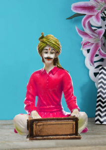 Ancient Notes in Resin: Exquisite Sculpture of a Rajasthani Harmonium Player - Karigaari India Aesthetic Home Decor
