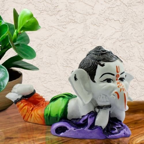 Bal Ganesh Sleeping Multicolor Idol for Home Decor - Karigaari India Aesthetic Home Decor
