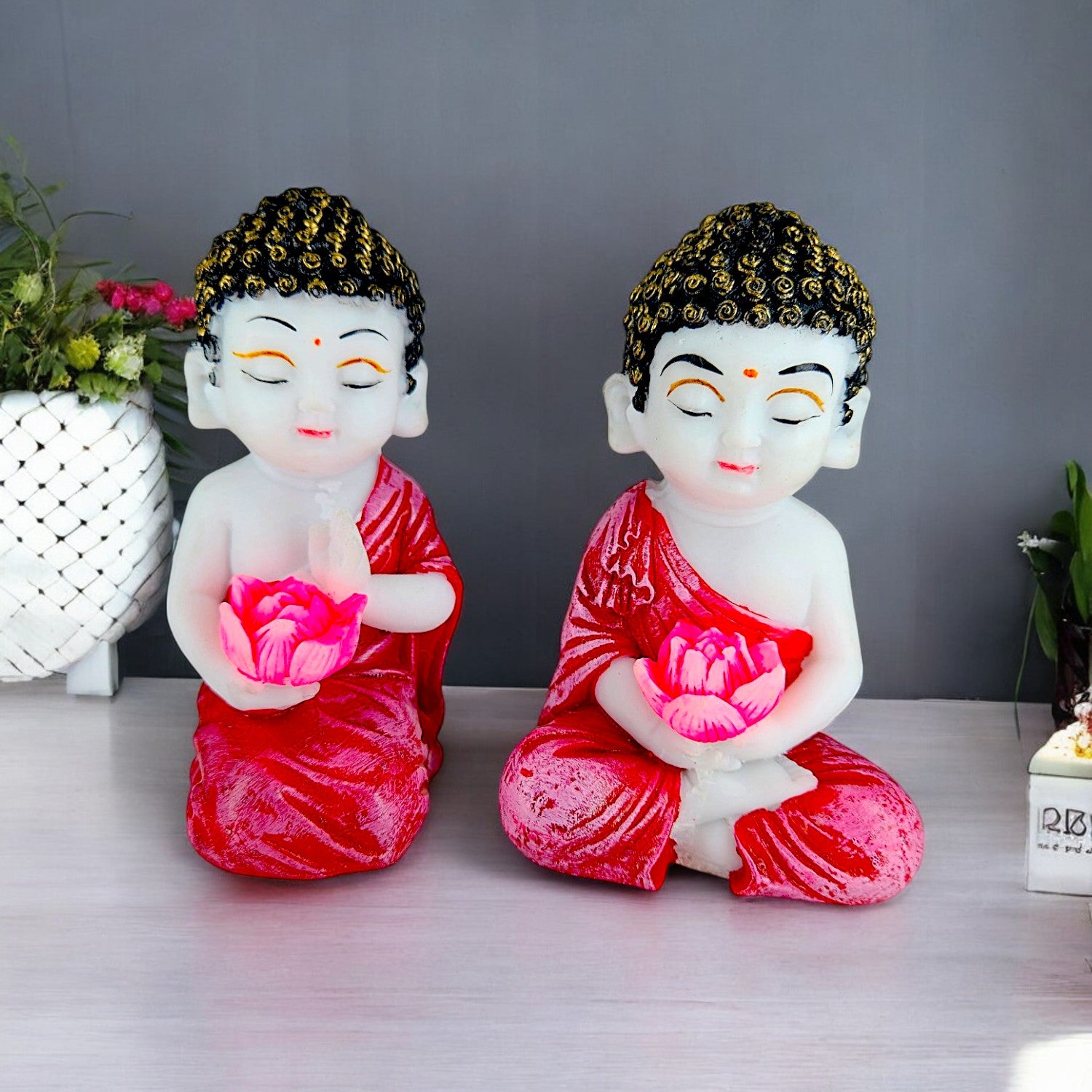 Graceful Collection Of 2 Resin Baby Buddha Idols With Lotus Meditating Buddha Showpieces In Red Robe For Home Decor Spiritual Corners Gifting Modern Ornament 1 Set of 2 Resin Baby Buddha Idols with Lotus | Meditating Buddha Showpieces in Red Robe for Home Decor, Spiritual Corners & Gifting | - Karigaari India Aesthetic Home Decor