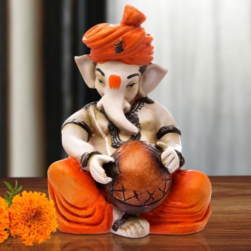 Graceful Little Lord Ganesha Figurine Playing Instruments Best One Of A Kind Design Orange For Home Decoration Premium Home Decor 1 Little Lord Ganesha Idol Playing Instruments Best & Unique Design Orange for Home Decor - Karigaari India Aesthetic Home Decor