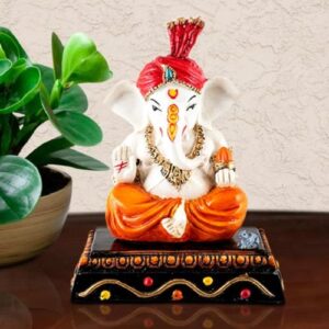 Lord Ganesha Sitting & Giving Blessing With Modak In Hand Best & Unique Design Orange Color for Home Decor - Karigaari India Aesthetic Home Decor