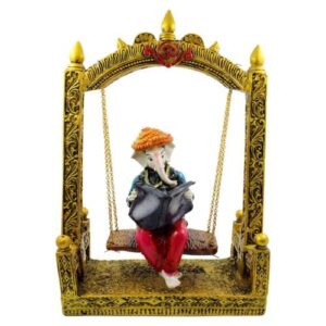 Lord Ganesha Sitting on Jhula Reading newspaper Idol for Home Decor - Karigaari India Aesthetic Home Decor